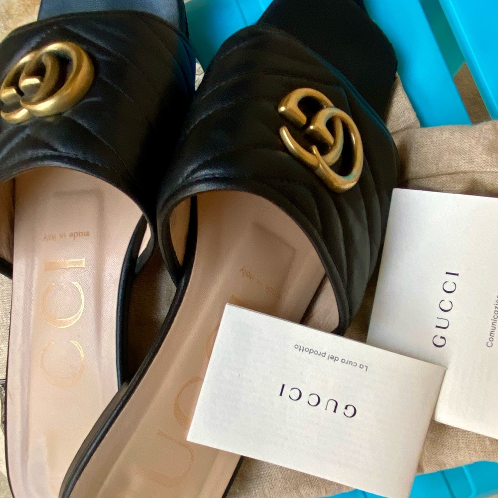 Gucci Black Leather Mules with Gold GG Logo